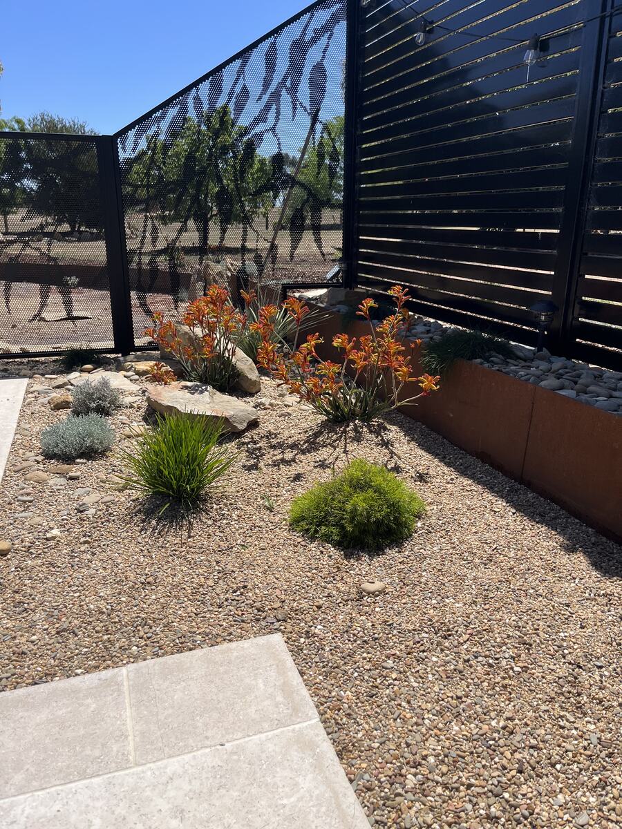 Gum design panel in Textured Black beside a garden, Melbourne VIC
