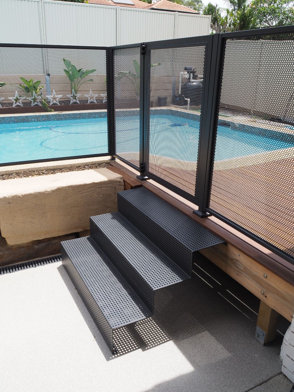 Monument pool fencing with custom stairs, Queensland